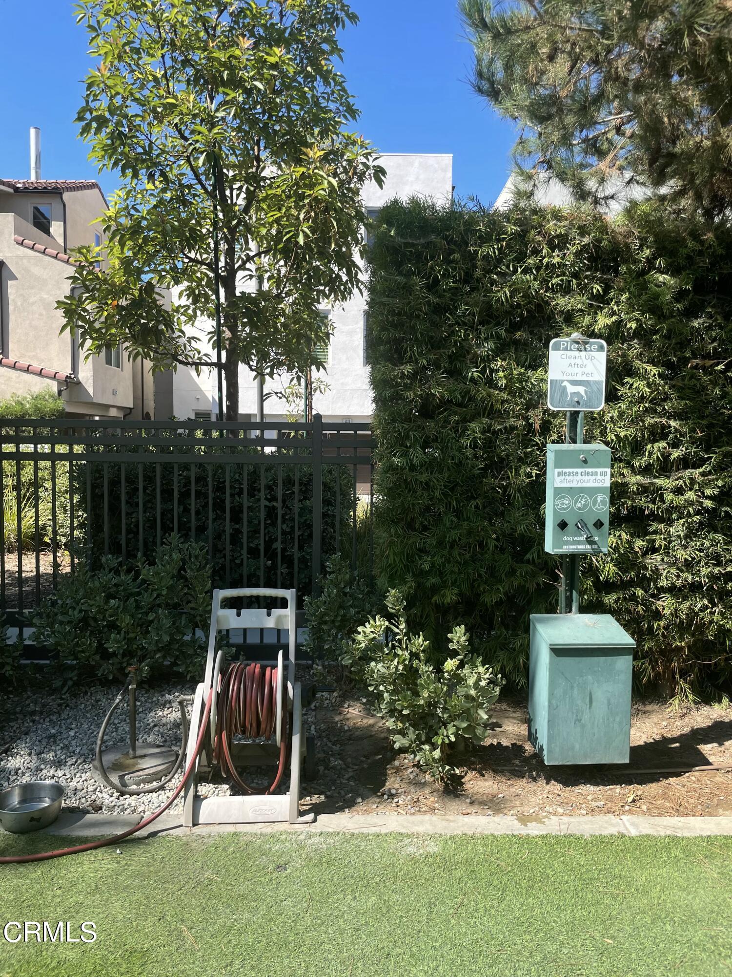 5524 Palm Drive Hawthorne, CA 90250 - Photo 27 of 46 a view of a wooden fence and a bench