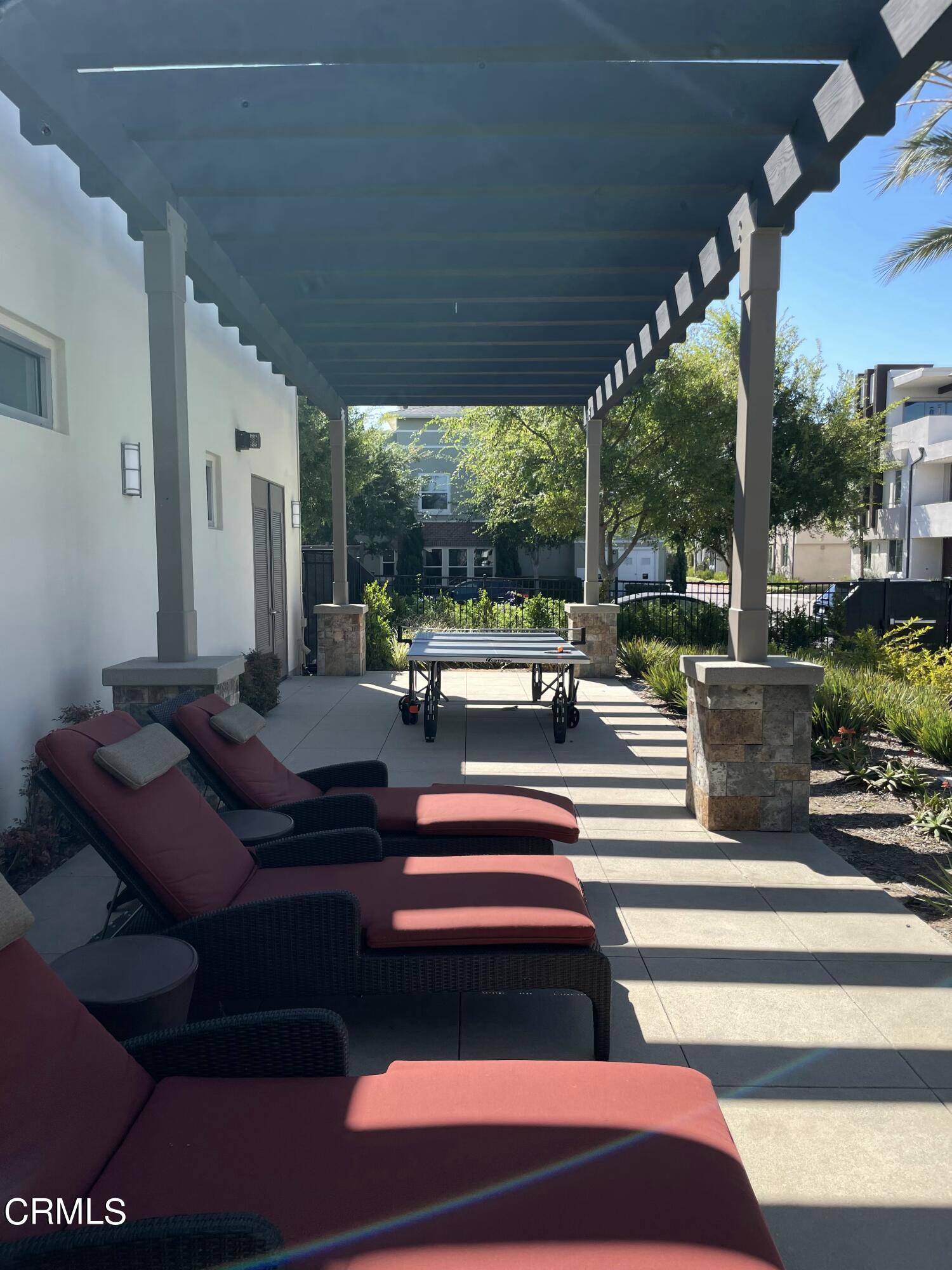 5524 Palm Drive Hawthorne, CA 90250 - Photo 39 of 46 a building outdoor space with patio furniture and potted plants