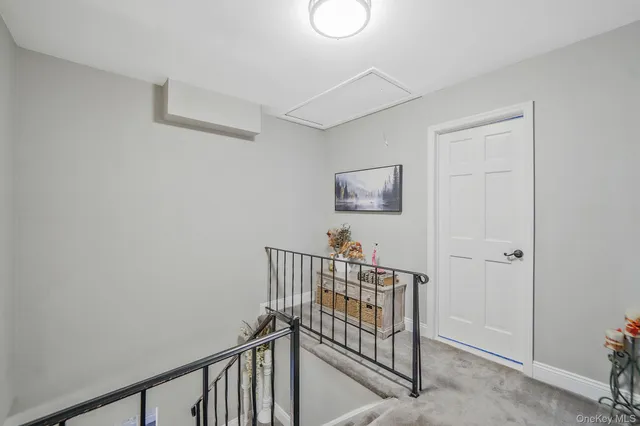 a view of a hallway with workspace