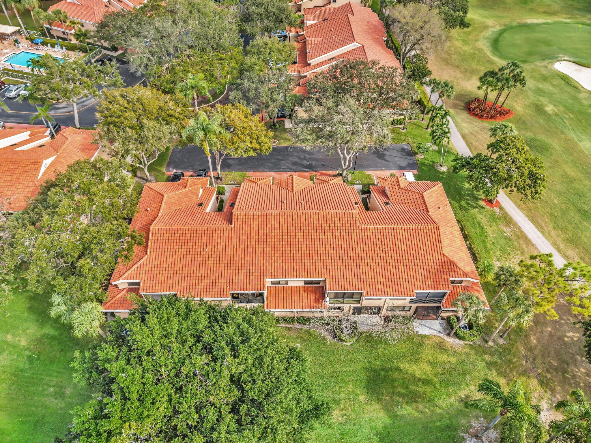 17372 Boca Club Boulevard, Unit 405 Boca Raton, FL 33487 - Photo 58 of 74 an aerial view of residential houses with outdoor space and street view