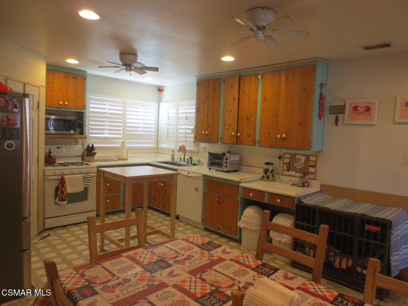 4521 Alpine Street Simi Valley, CA 93063 - Photo 2 of 62 a kitchen with a sink appliances cabinets and furniture