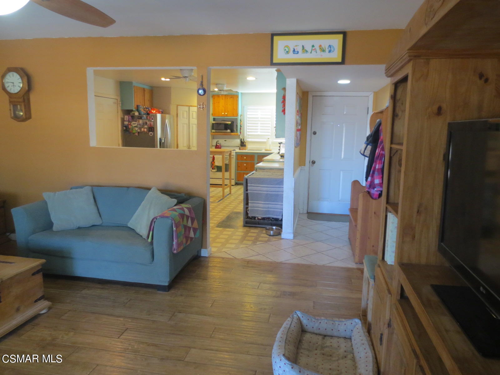 4521 Alpine Street Simi Valley, CA 93063 - Photo 3 of 62 a living room with furniture and a flat screen tv