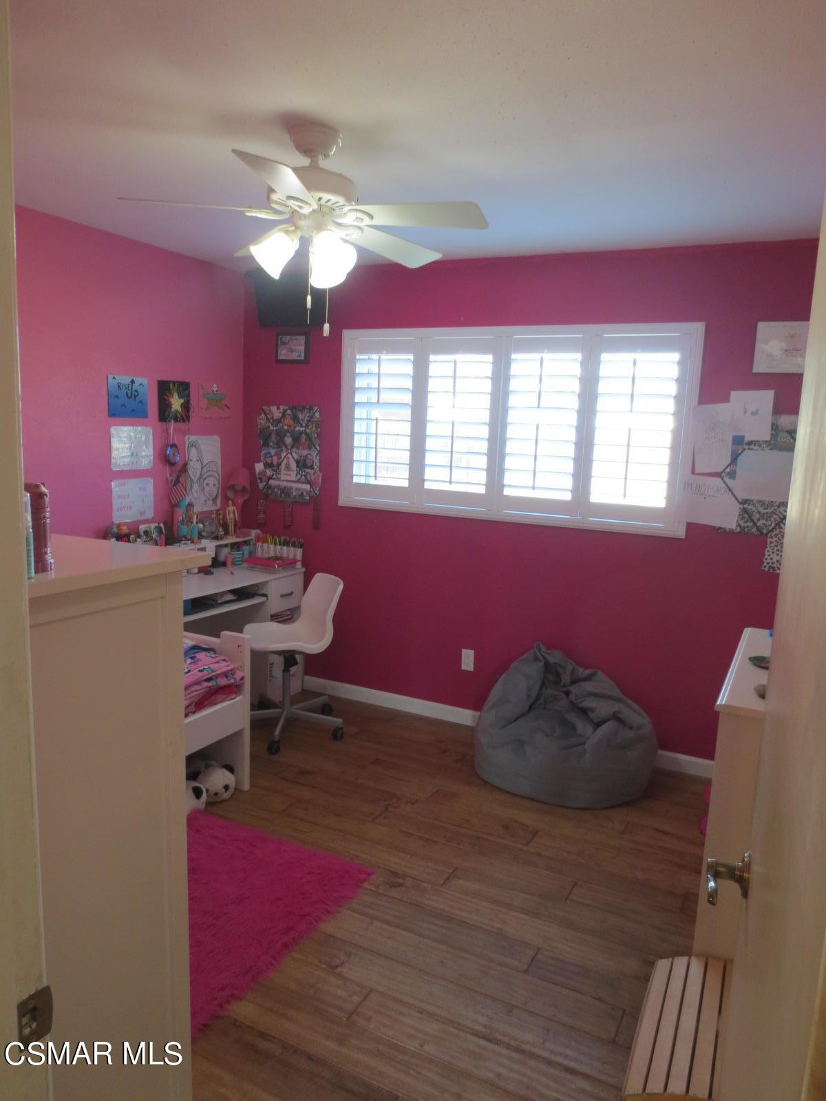 4521 Alpine Street Simi Valley, CA 93063 - Photo 23 of 62 a living room with furniture and a chandelier