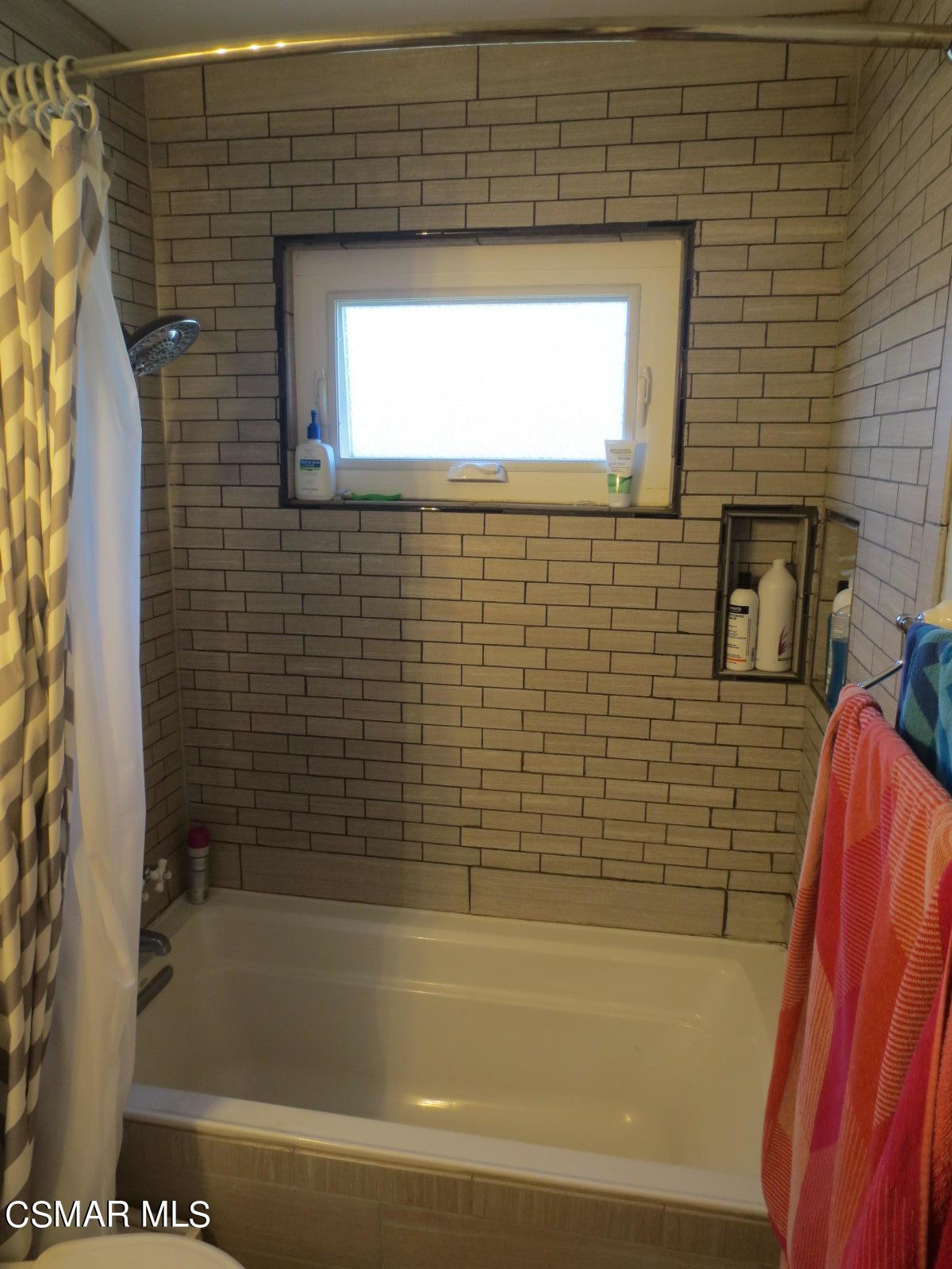 4521 Alpine Street Simi Valley, CA 93063 - Photo 28 of 62 a bathroom with a bathtub and a shower