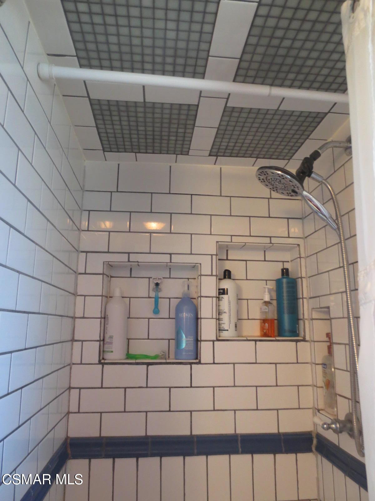 4521 Alpine Street Simi Valley, CA 93063 - Photo 38 of 62 a bathroom with a shower