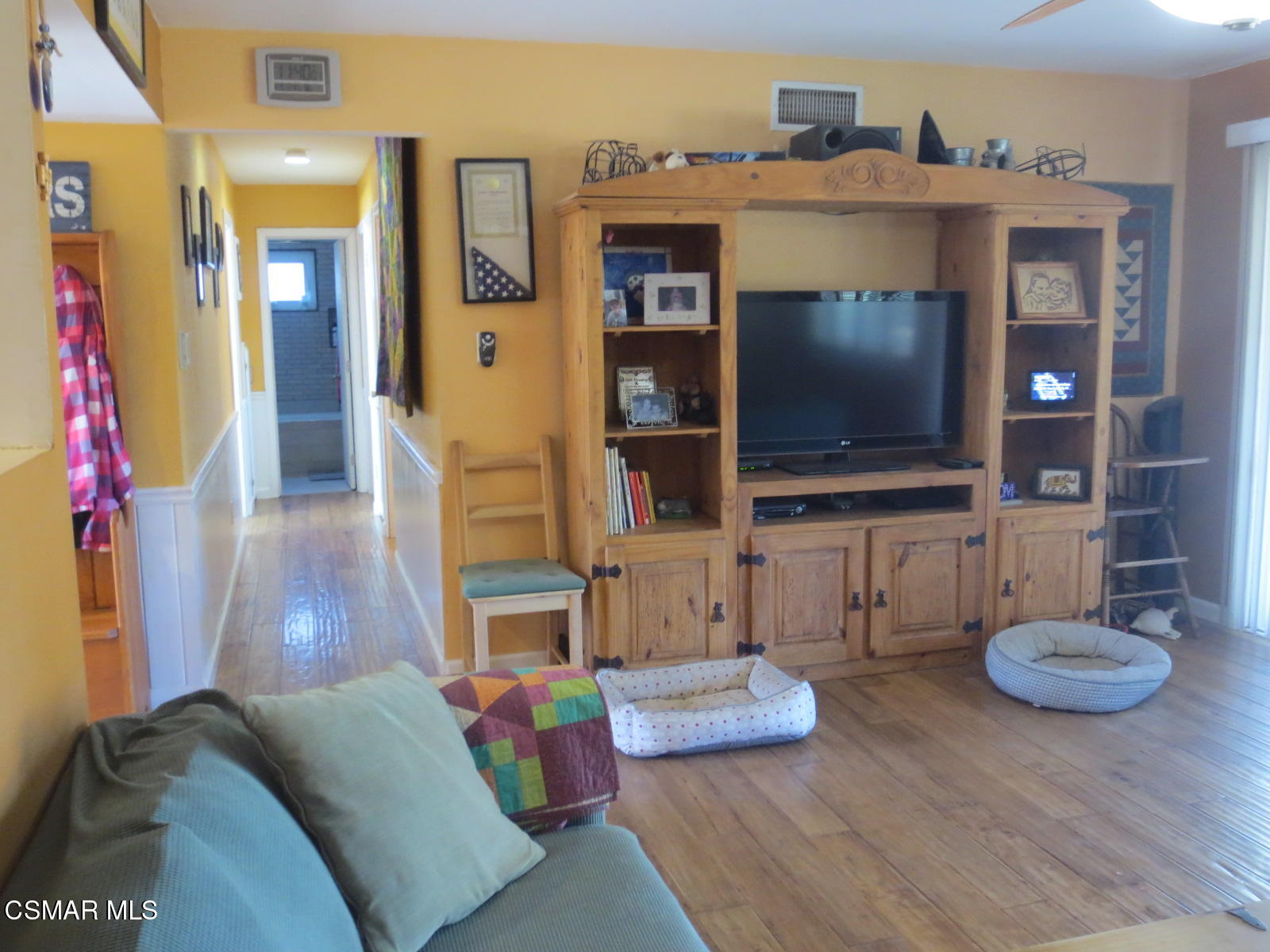 4521 Alpine Street Simi Valley, CA 93063 - Photo 43 of 62 a living room with furniture and a flat screen tv