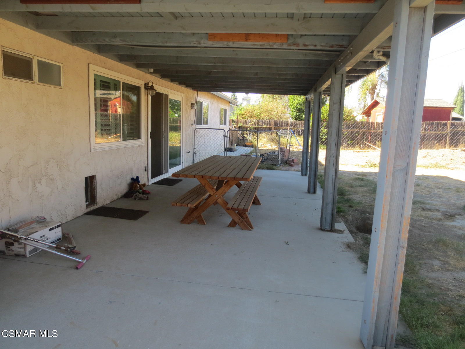 4521 Alpine Street Simi Valley, CA 93063 - Photo 54 of 62 a view of a patio with table and chairs