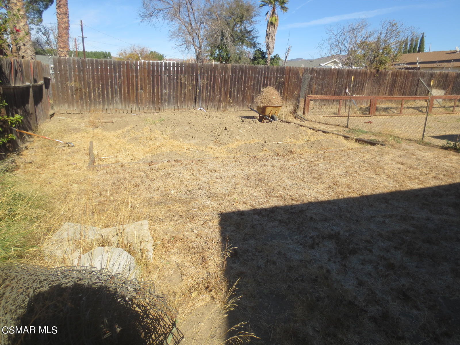 4521 Alpine Street Simi Valley, CA 93063 - Photo 58 of 62 a view of a yard with a bench