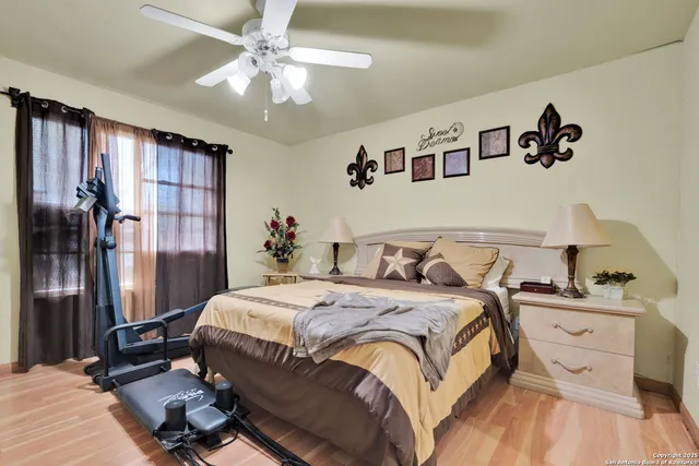 a bedroom with a bed furniture and a window