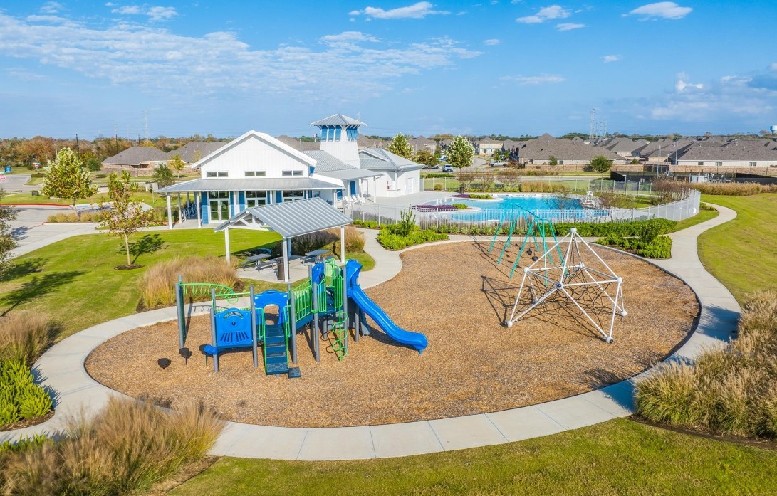 31527 Fern Grove Road Fulshear, TX 77423 - Photo 17 of 21 an aerial view of a swimming pool with outdoor seating