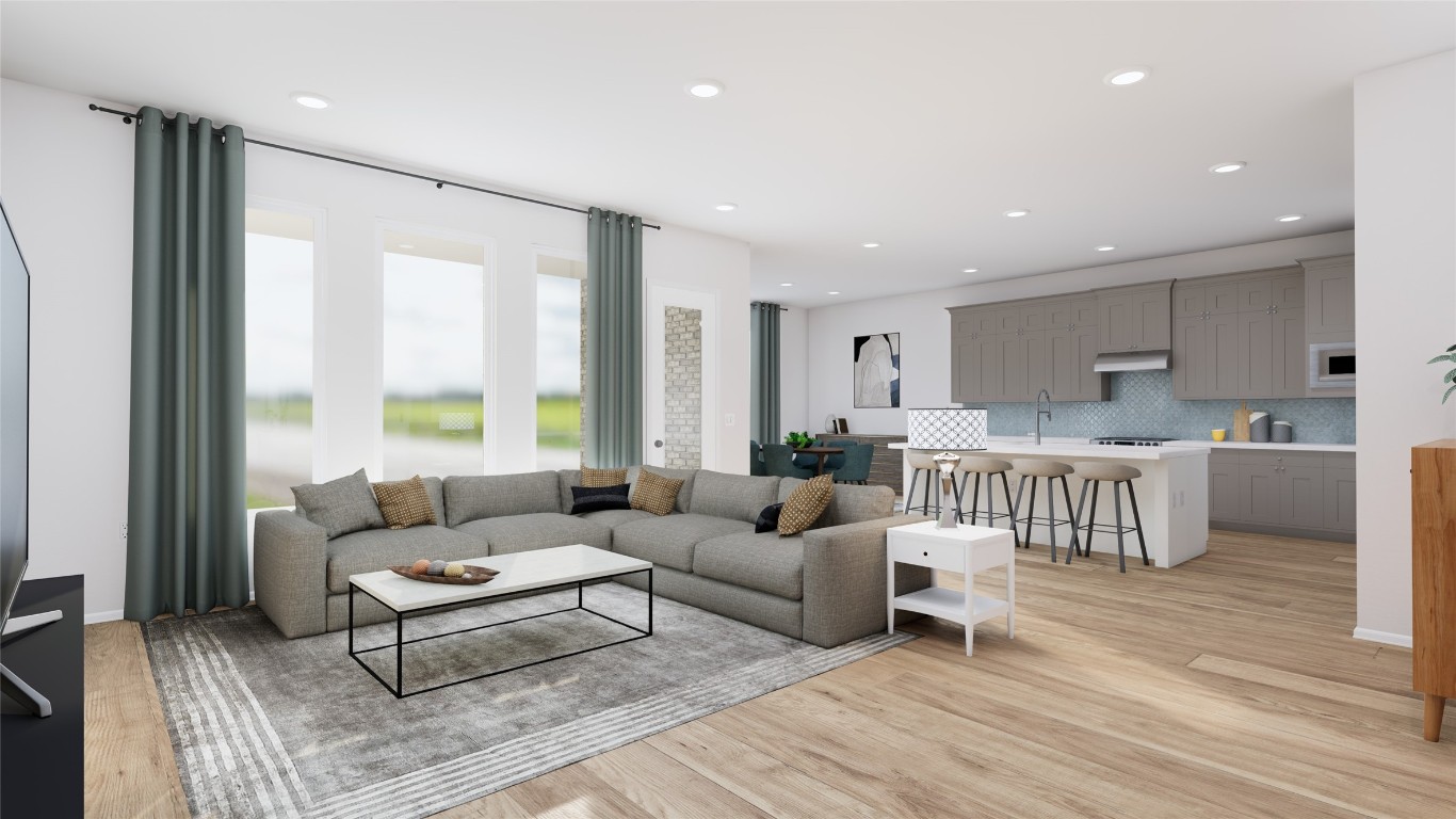 31527 Fern Grove Road Fulshear, TX 77423 - Photo 4 of 21 a living room with furniture and a large window