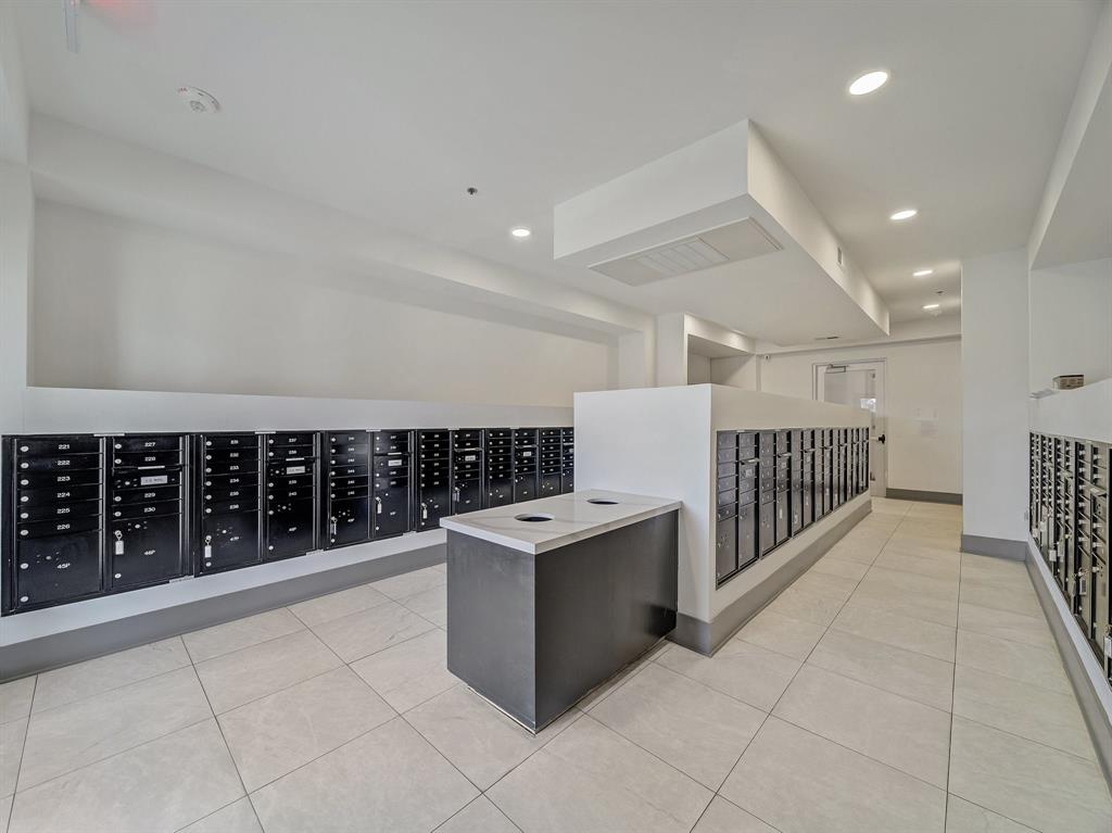 2700 Old Denton Road, Unit 4407 Carrollton, TX 75007 - Photo 31 of 34 a kitchen with stainless steel appliances a refrigerator and a stove