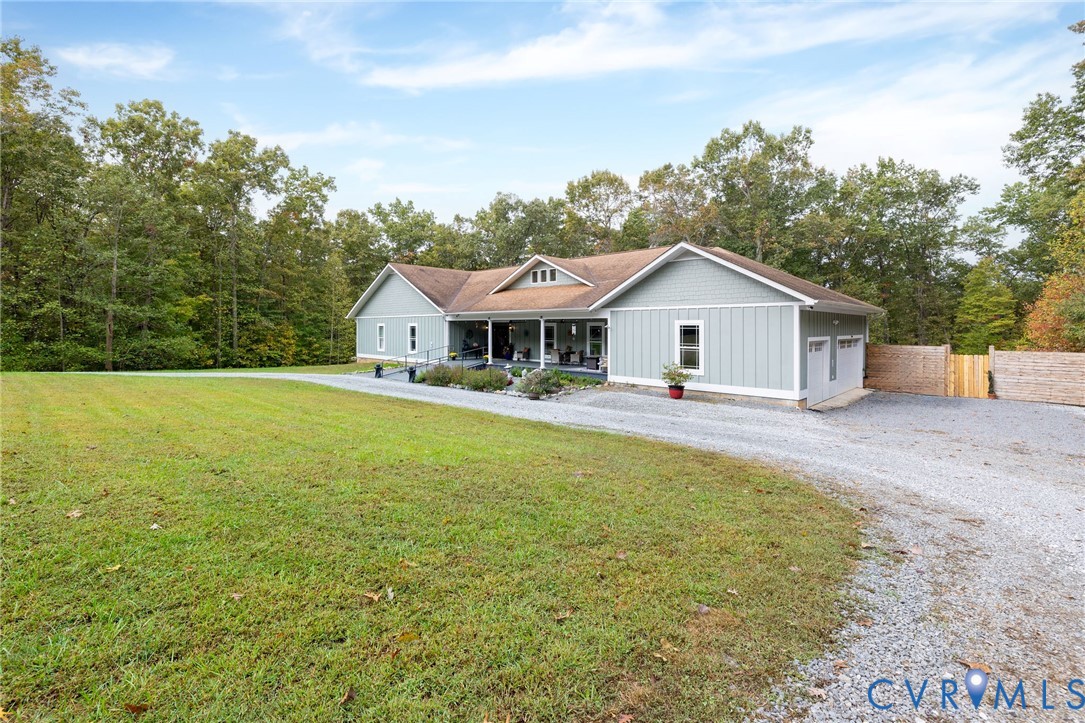 11081 Shannon Hill Road Louisa, VA 23093 - Photo 2 of 49 a house with swimming pool in front of it