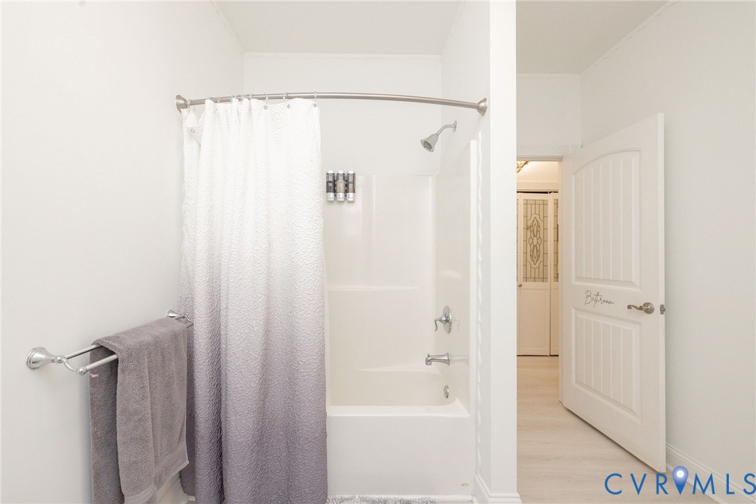 11081 Shannon Hill Road Louisa, VA 23093 - Photo 29 of 49 a bathroom with a shower and a bath tub