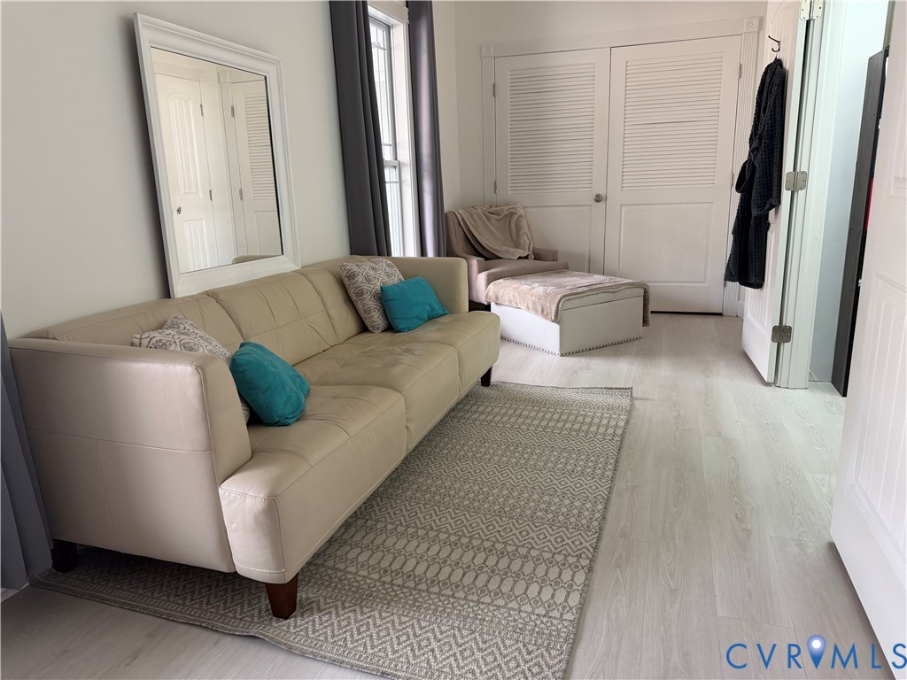 11081 Shannon Hill Road Louisa, VA 23093 - Photo 33 of 49 a living room with furniture and a rug
