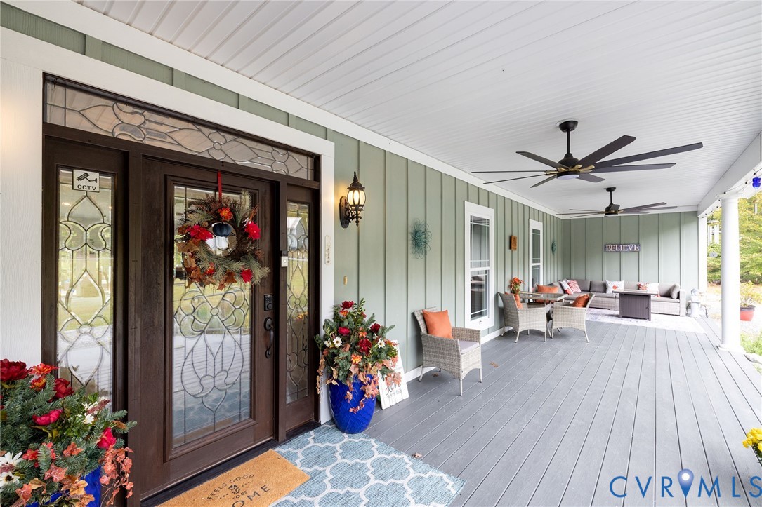 11081 Shannon Hill Road Louisa, VA 23093 - Photo 4 of 49 a living room with furniture and flowers