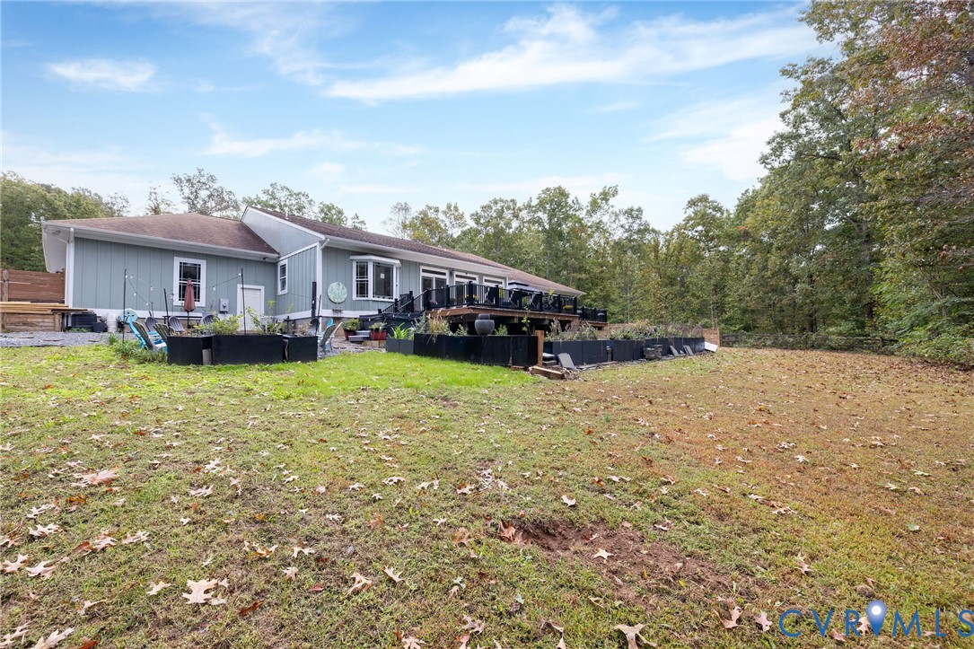 11081 Shannon Hill Road Louisa, VA 23093 - Photo 41 of 49 a view of a house with a yard and sitting area