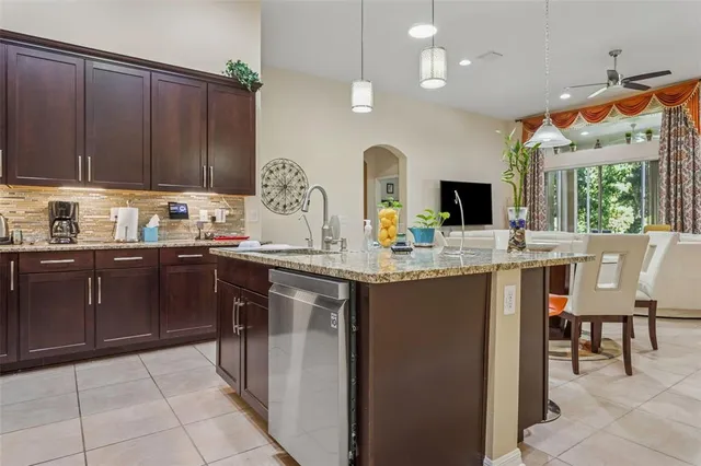 a bedroom with a bed and a bookshelf