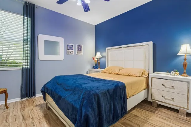 a bathroom with a sink mirror vanity and toilet