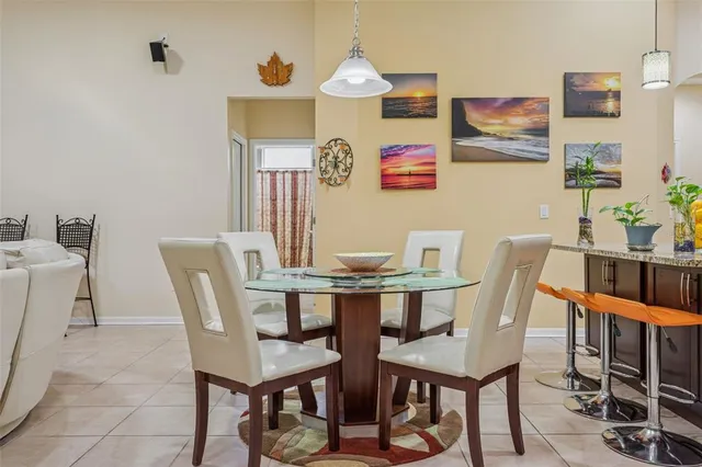 a kitchen with stainless steel appliances granite countertop a stove refrigerator sink and cabinets