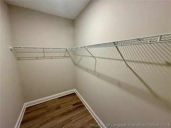 a view of a room with racks on the wall