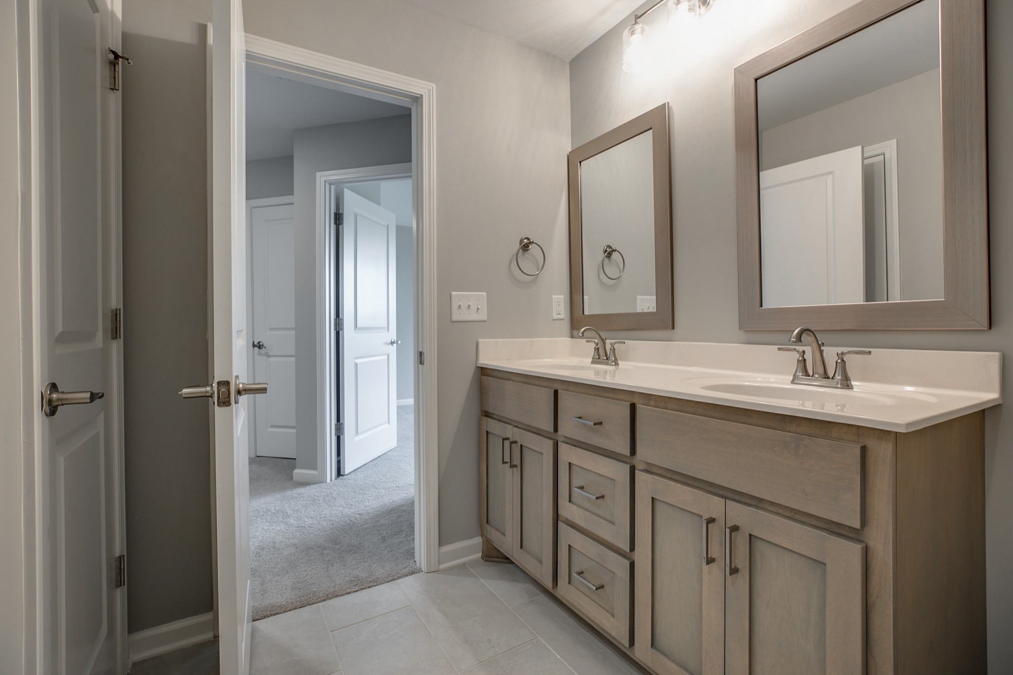 248 Doak Road Manchester, TN 37355 - Photo 18 of 23 a bathroom with a double vanity sink mirror and next