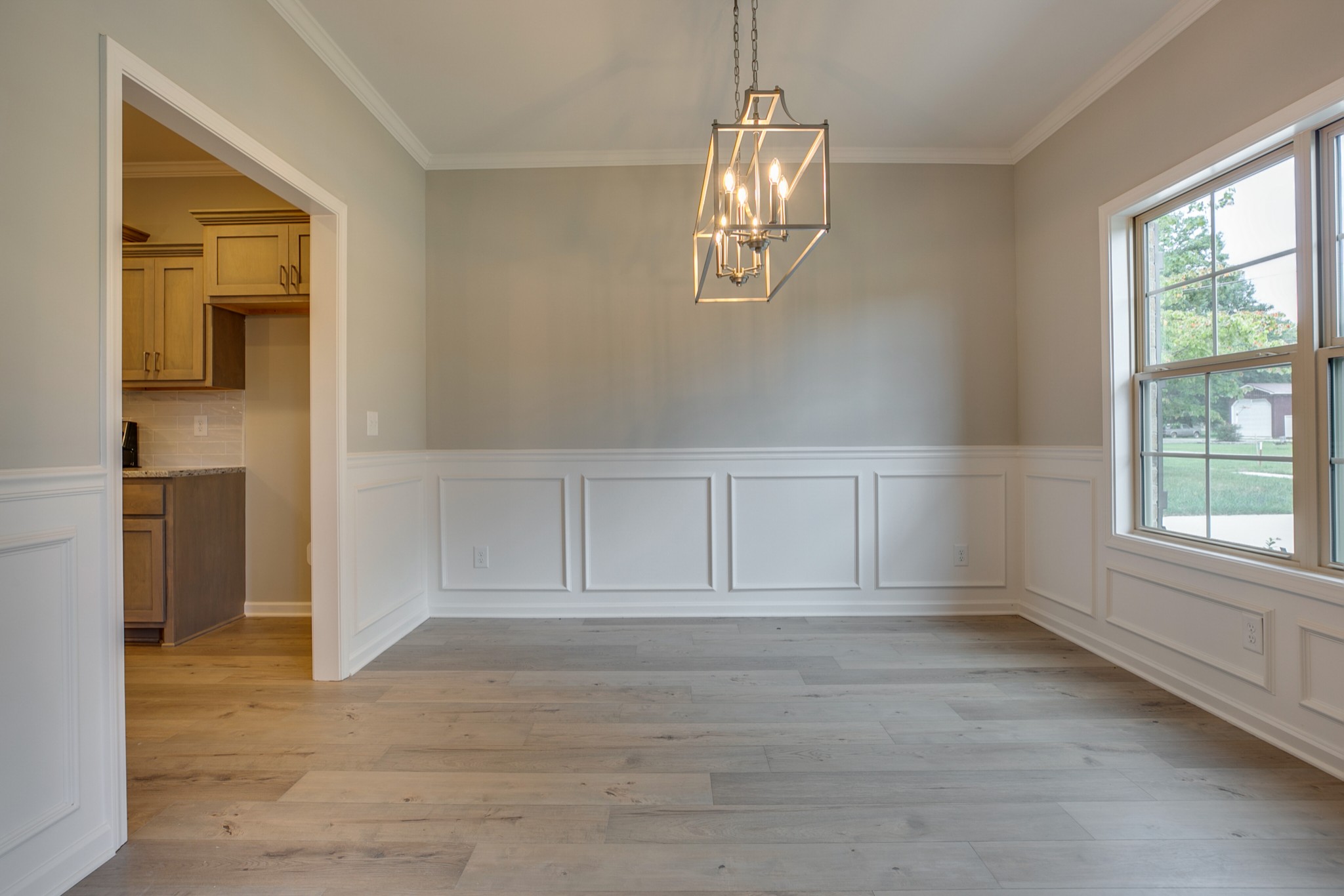 248 Doak Road Manchester, TN 37355 - Photo 10 of 23 an empty room with chandelier fan and windows