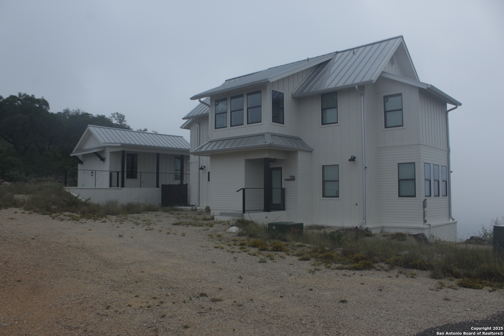 a front view of a house with garage