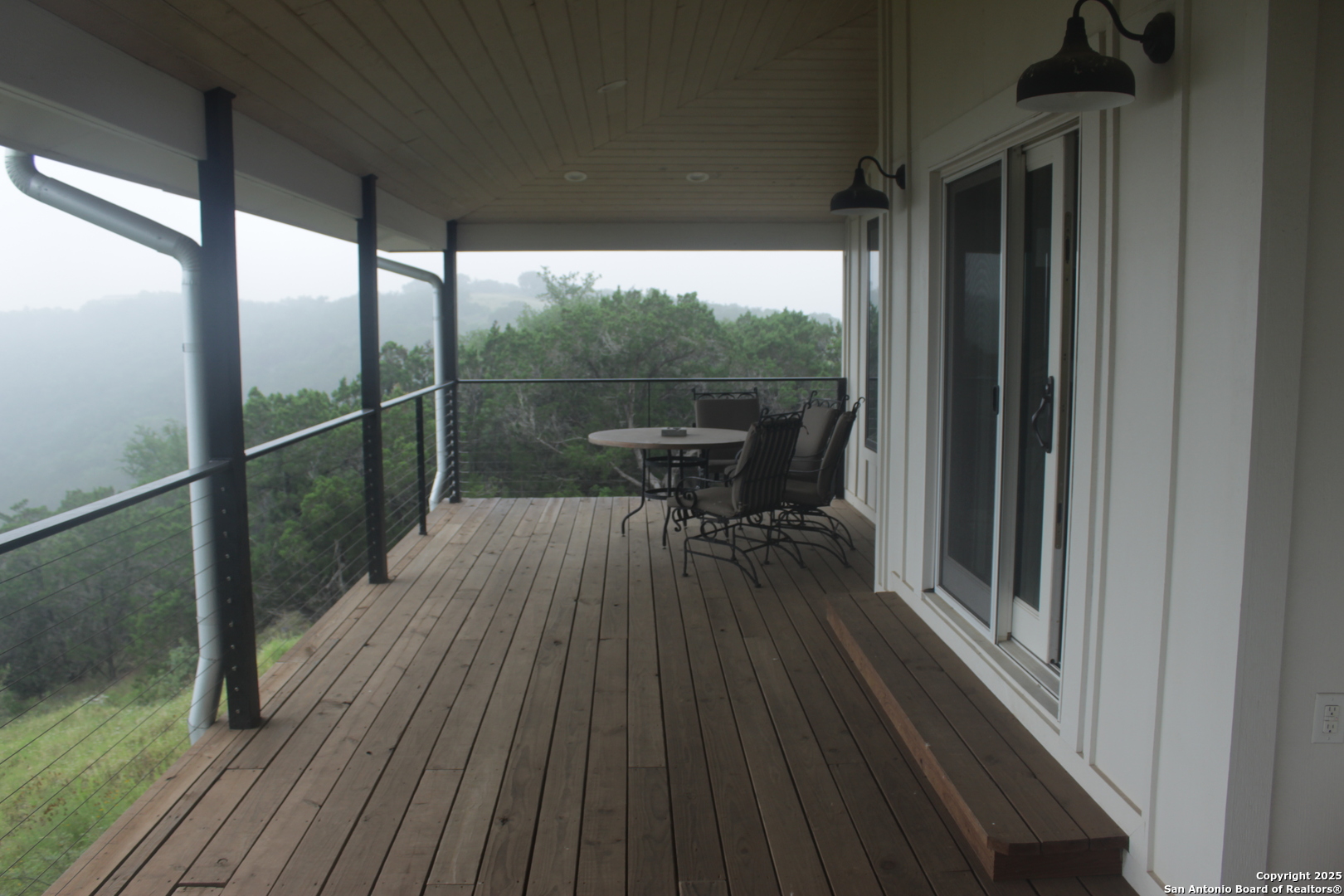 47 North Valley Vista Rio Frio, TX 78879 - Photo 2 of 8 a view of a two chairs in the balcony