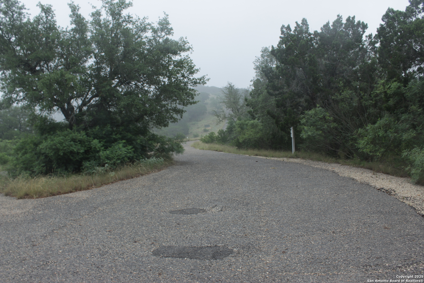 47 North Valley Vista Rio Frio, TX 78879 - Photo 8 of 8 a view of a field with trees in background