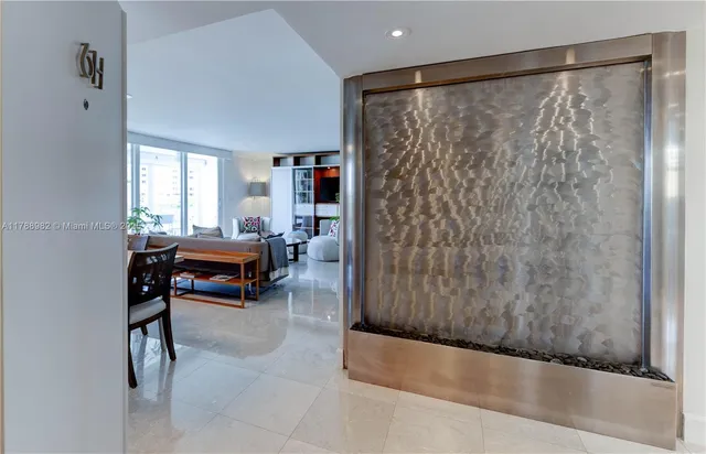 a living room with furniture and a gate