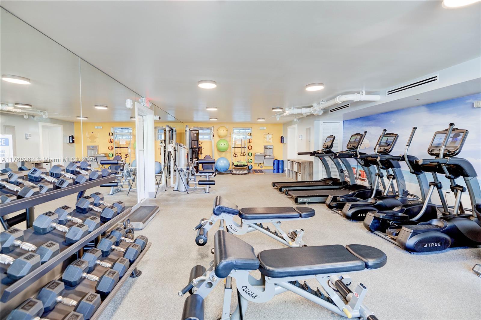 609 Ocean Drive, Unit 6H Key Biscayne, FL 33149 - Photo 27 of 32 a view of a room with gym equipment