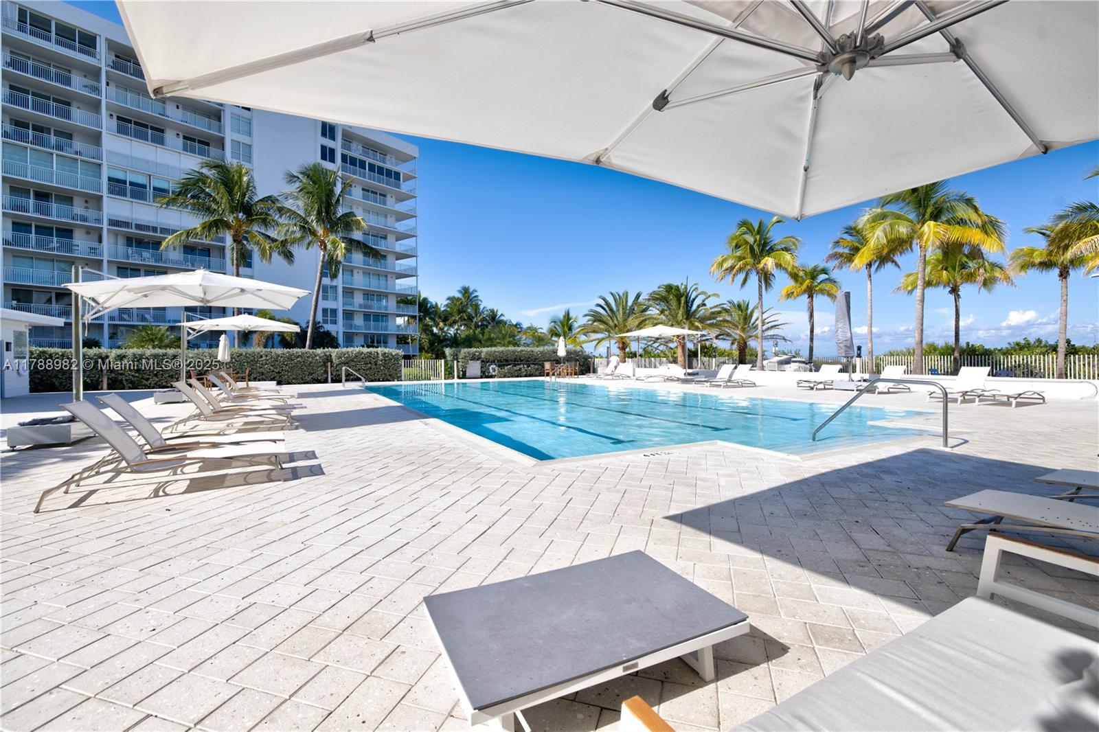 609 Ocean Drive, Unit 6H Key Biscayne, FL 33149 - Photo 29 of 32 an outdoor space with patio