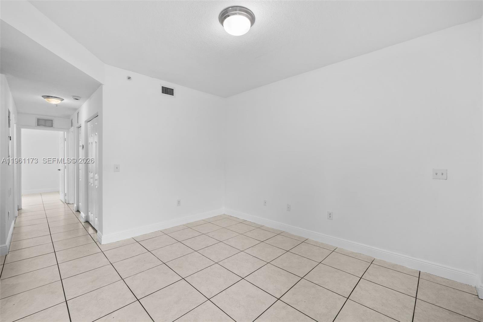 2437 West 78th Street, Unit 104 Hialeah, FL 33016 - Photo 11 of 21 a view of a room with white walls