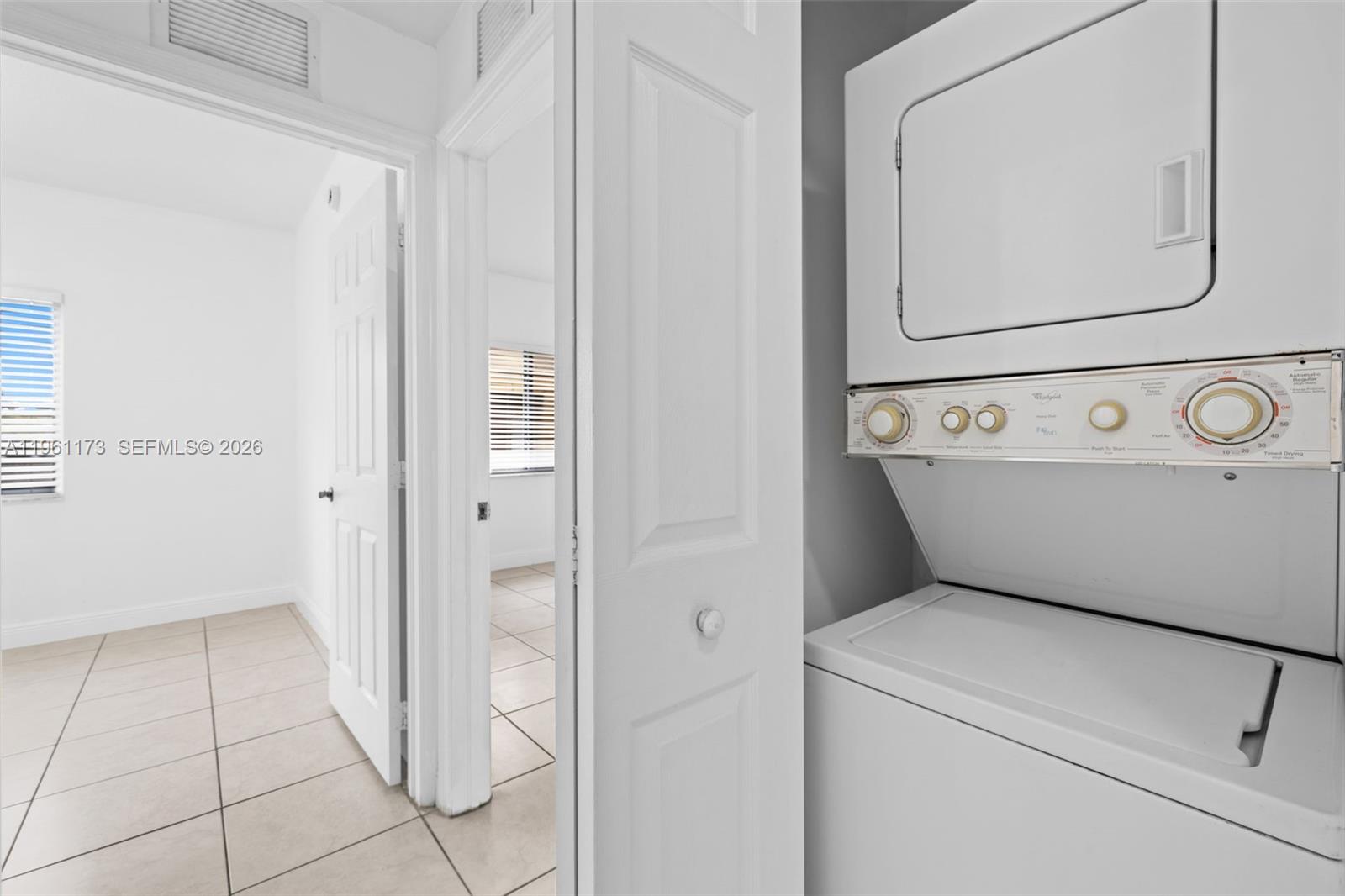 2437 West 78th Street, Unit 104 Hialeah, FL 33016 - Photo 21 of 21 a view of bathroom with washer and dryer