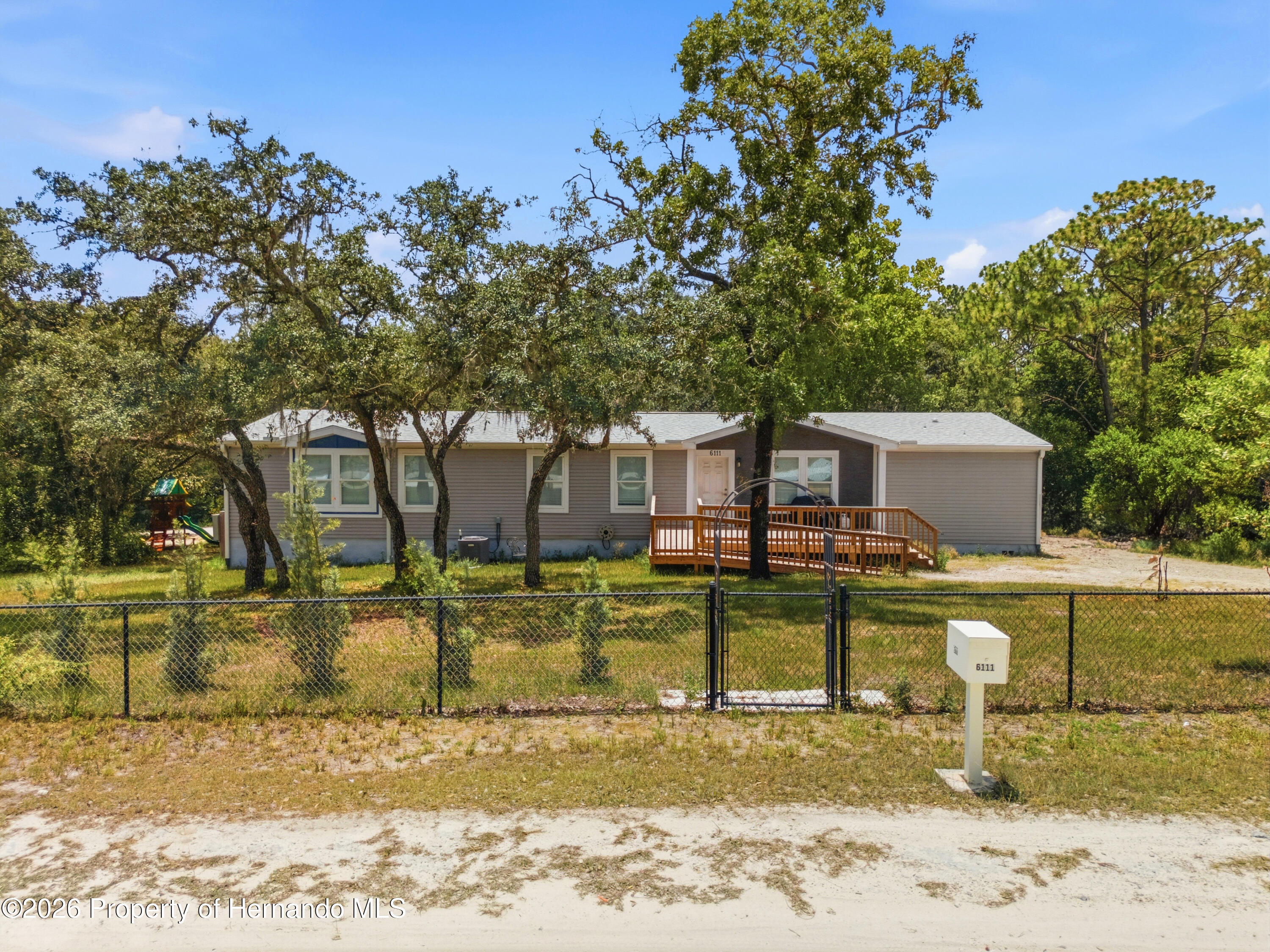 6111 Cartwrite Road Spring Hill, FL 34609 - Photo 1 of 44