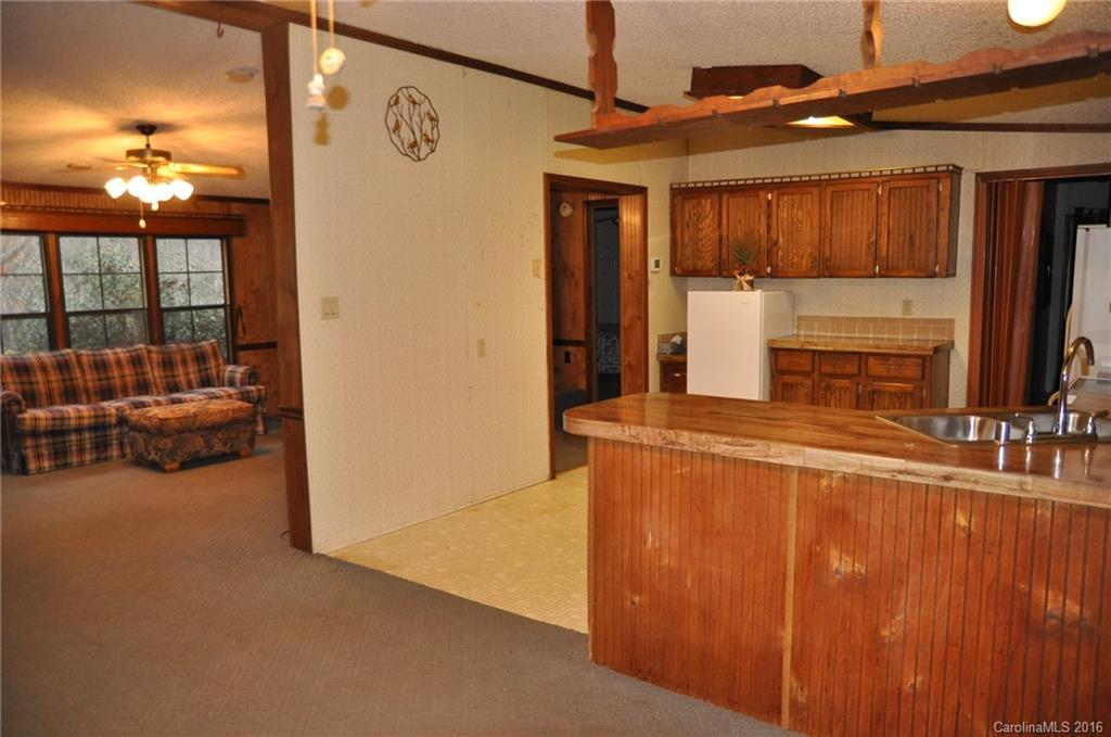 2919 Belk Mill Road Wingate, NC 28174 - Photo 15 of 24 a view of living room with furniture and a flat screen tv