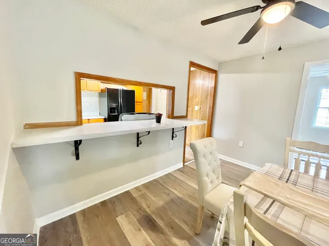 a living room with patio furniture