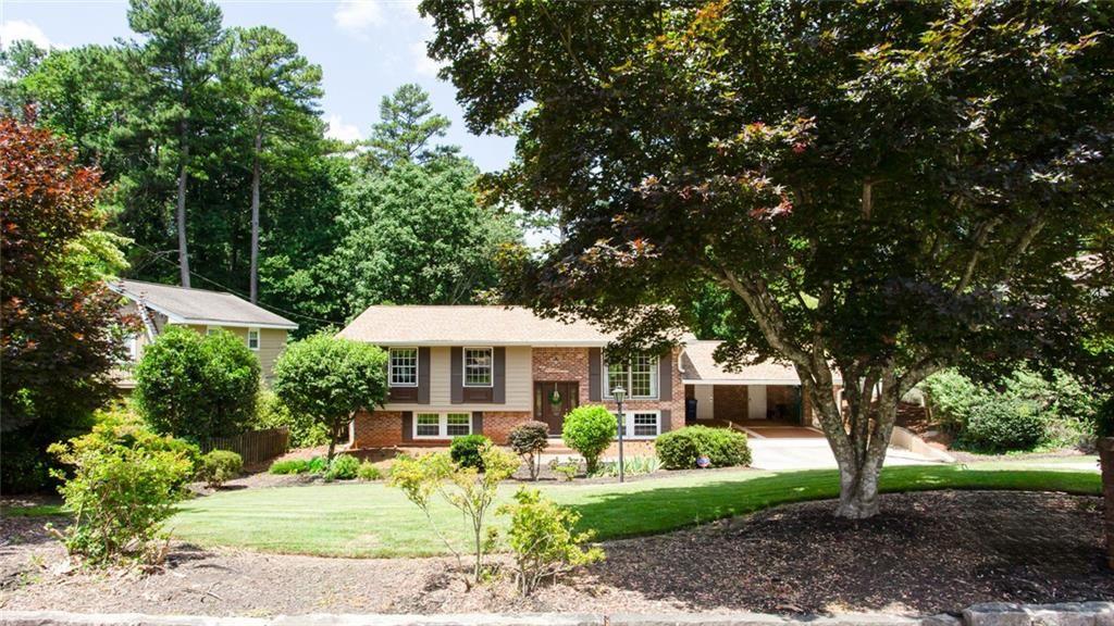 2814 Goodfellows Road Tucker, GA 30084 - Photo 2 of 46 a front view of a house with a yard