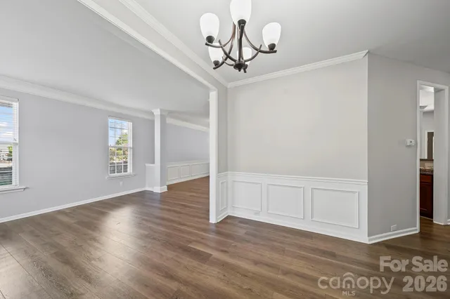 a view of a livingroom with wooden floor