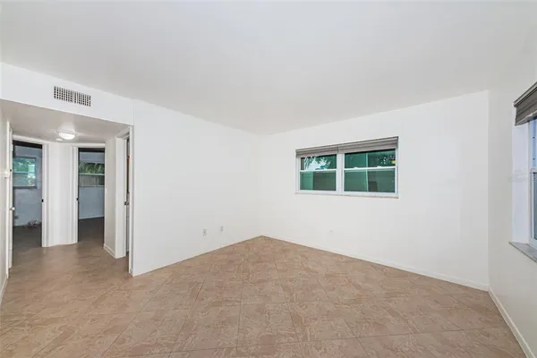 an empty room with windows