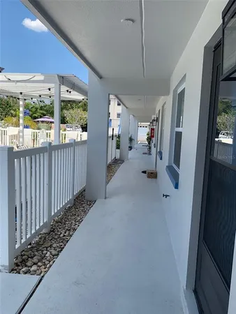 a view of hallway with livingroom