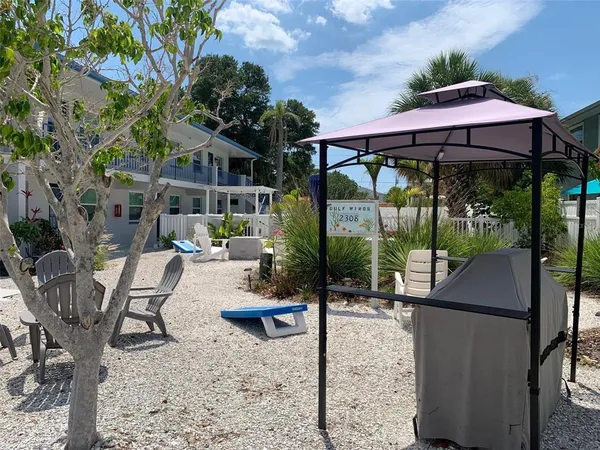 a view of patio with furniture