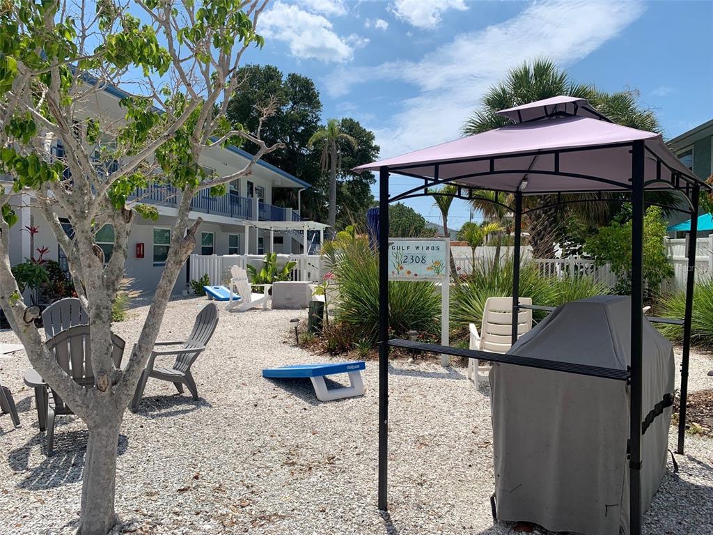 2308 1st Street, Unit 4 Indian Rocks Beach, FL 33785 - Photo 24 of 25 a view of patio with furniture