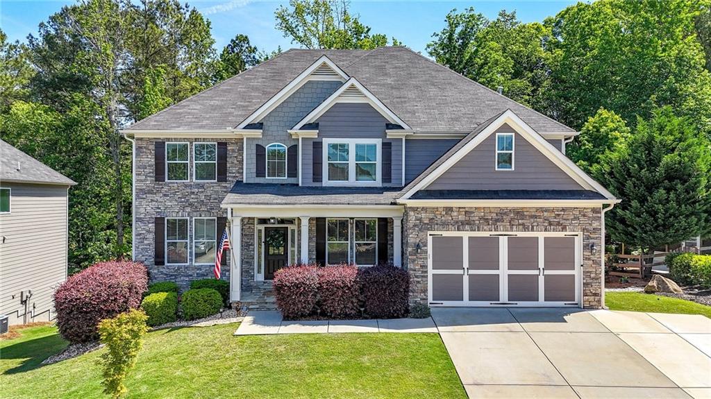 22 Turtle Rock Place Acworth, GA 30101 - Photo 1 of 70 a front view of a house with garden