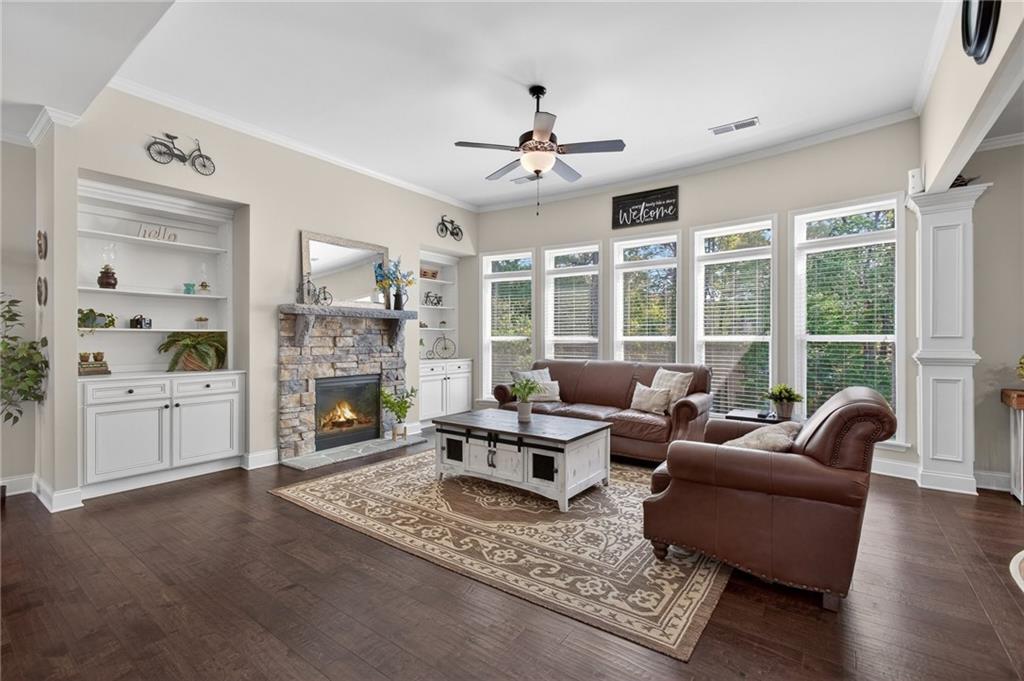 22 Turtle Rock Place Acworth, GA 30101 - Photo 13 of 70 a living room with furniture and large windows