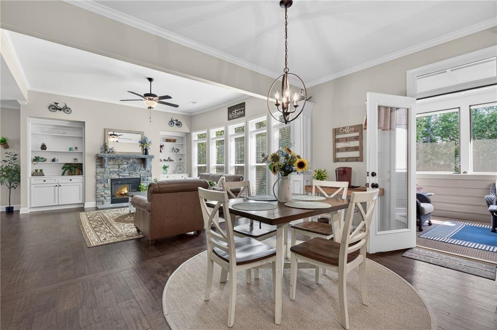 22 Turtle Rock Place Acworth, GA 30101 - Photo 16 of 70 a view of a dining room with furniture window and wooden floor