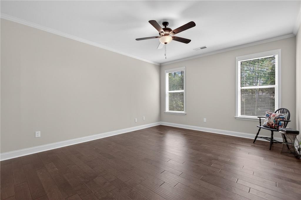 22 Turtle Rock Place Acworth, GA 30101 - Photo 26 of 70 a view of an empty room with wooden floor and a window
