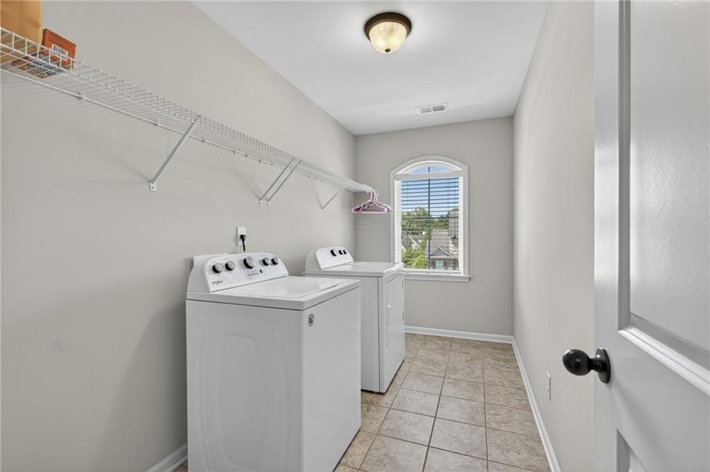 22 Turtle Rock Place Acworth, GA 30101 - Photo 48 of 70 a utility room with dryer and washer