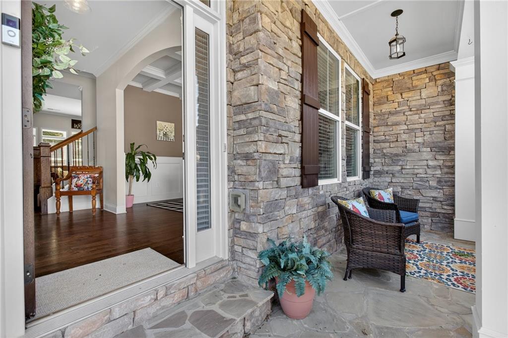 22 Turtle Rock Place Acworth, GA 30101 - Photo 6 of 70 a view of a balcony with chairs and a potted plant